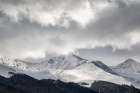 USA, Colorado, Summit County, Frisco. Sunlight breaks through clouds along the Tenmile Range. Art Print